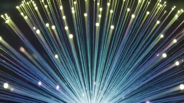 Abstract background featuring radiant, colorful lines and particles emanating from a central point. The lines display a spectrum of blues, greens, and purples, while glowing particles add visual inter