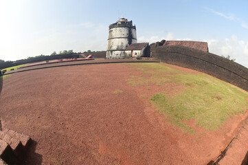 Aguada Fort is a built in 1612 along with a lighthouse, located on Sinquerim Beach in Goa, India, overlooking the Arabian Sea. The fort is a major tourist attraction.