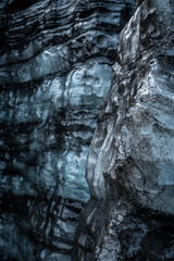Ice cave in the glacier in Iceland. Toned blue image.