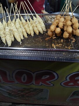 Close up photo of Indonesian street food: rolled egg and sempol