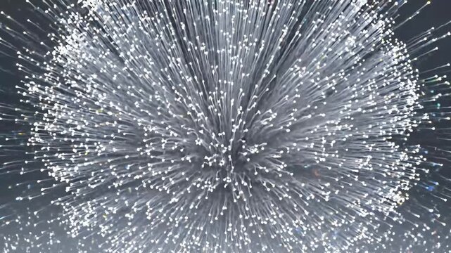 Abstract shimmering light particles expanding outwards in a dynamic glowing explosion Futuristic digital fiber optic network connections radiating energy perfect