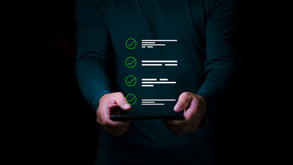 Businessman checking a checkbox for quality control checklist online inspection form, business project approval concept. Digital form checklist.