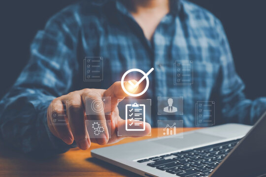 Businessman verifying digital identity and KYC documents using smart technology, representing secure authentication, online approval, and digital onboarding on business platforms.