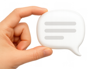 Hand holding white speech bubble icon, symbolizing online communication, chat, instant messaging, and digital social media concept