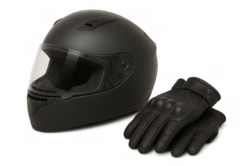 Black motorcycle helmet protecting rider's head with matching leather gloves for road safety and motorsports activities