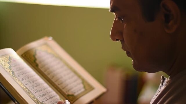 Man Reading Book in Soft Light - A Moment of Reflection.