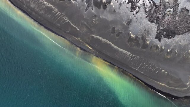 Stunning unique black sand beach in Iceland, Unique coastline abstract pattern, unearthly landscape