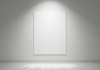 Blank white canvas on a wall illuminated by a spotlight perfect for art gallery or presentation mock