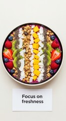 Healthy smoothie bowl filled with fresh fruits and granola