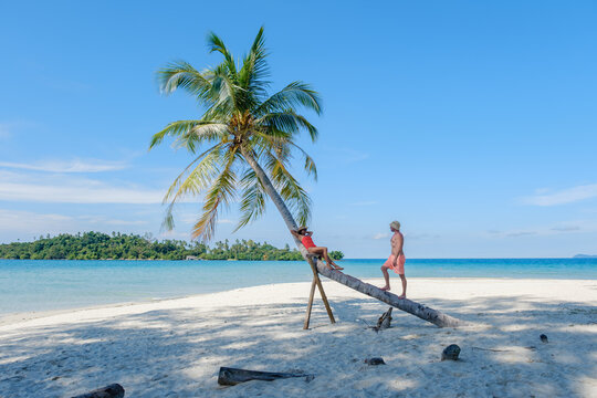 Discovering the serene beauty of Koh Kood Island, Thailand with friends on a sunny day