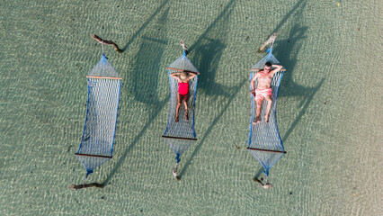 Relaxing hammocks under the sun on Koh Kood Island in Thailand
