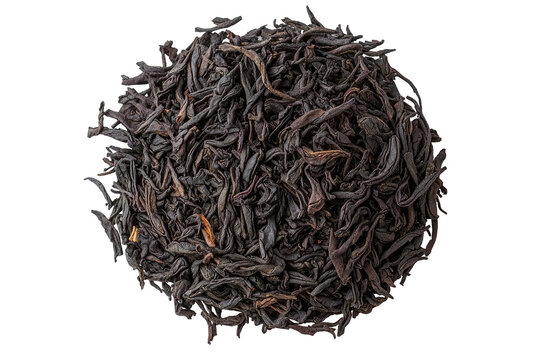 Pile of dark, dried, crinkled tea leaves on black backdrop