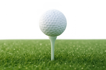 Golf ball on a tee ready for a swing on green grass with a transparent background, leisure sport concept
