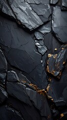 Close-up shot shows fractured dark slate rock face with fine gold veins and rough texture