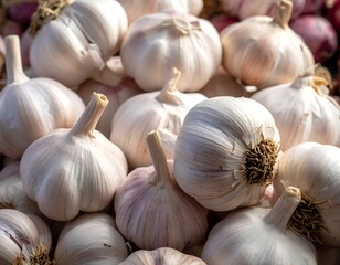 Close-up showcases pile of fresh garlic bulbs, highlighting textures and subtle color variations