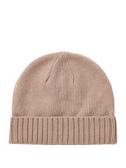 Warm knitted winter cap on a plain white backdrop for woman