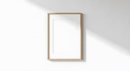 Blank wooden frame mockup on white wall natural light and shadow overlay for artwork display