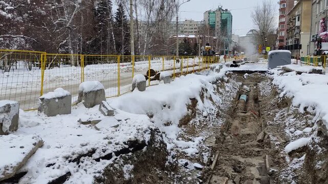 NOVOSIBIRSK, SIBERIA - 14 NOVEMBER 2025: A utility accident in central Novosibirsk. A heating main burst during the winter. Editorial.