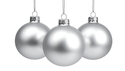Three shiny, silver ornaments hanging against a white backdrop