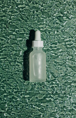 Plastic cosmetic bottle textured glass top view