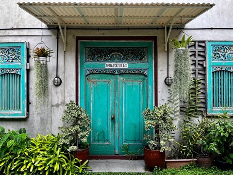 Vintage javanese door at Kedai Satu Lagi Kotagede on November 16, 2025 In Yogyakarta, Indonesia