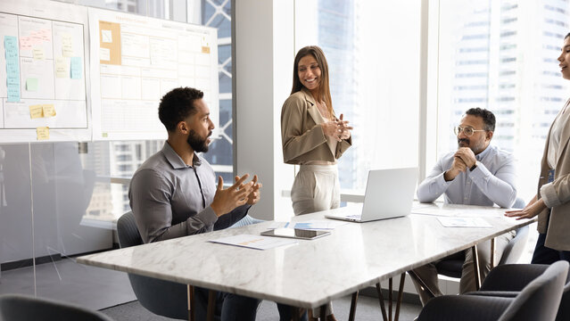 Diverse business team working on project together