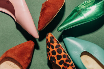 Vintage 1940s heels top view green background