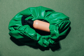 Green vintage bag and perfume jar minimalist