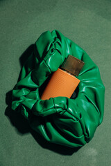 Green vintage bag and perfume jar minimalist