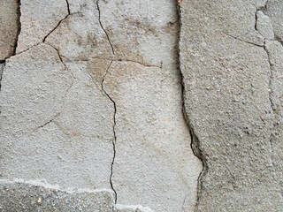 Crack wall texture background broken earthquake effect, whtie grey building cement damage pattern plaster grunge black line paint surface abstract, construction rough street concrete backdrop.