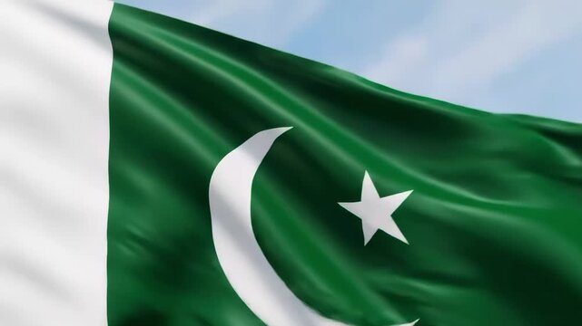 Waving pakistan national flag with crescent moon and star in the wind