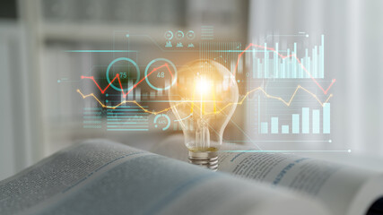 A light bulb emitting a warm glow sits atop an open book, surrounded by digital graphs and data analysis, capturing the essence of knowledge, innovation, and technology. Scalp
