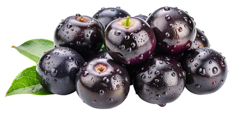 Fresh acai berries with water droplets and green leaves