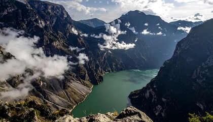 Aerial view of winding river canyon at golden hour