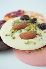 Colorful chocolate treats with nuts and fruits