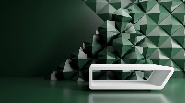 White rectangular object with a cutout on a green surface against a green geometric-patterned wall with a 3D effect.