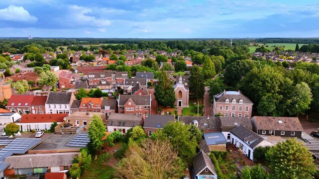Garden districts in warm evening. Warm sunlight illuminates residential zones in a small Dutch community.