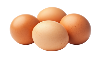 Four brown chicken eggs in a pile