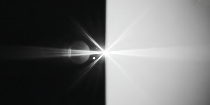 Abstract light effect with lens flare and bokeh on a black and white background