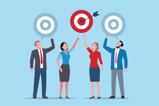 Diverse business team celebrating achieving their shared goal with an arrow hitting the bullseye on a target