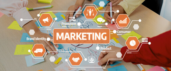 Creative business team brainstorming about marketing strategy and business plan by using mind mapping. Startup team work together to write down on paper. Focus on hand. Closeup. Variegated. Amity