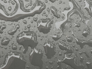 Closeup View of Rain Droplets on Metallic Surface. Background Concept