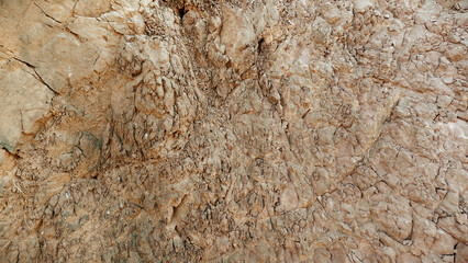 Rock and stone texture brown material background pattern. High resolution seamless rock diffuse texture. textured concrete. Abstract brown rock background. Close-up mountain texture. Seamless pattern