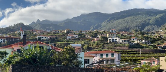Naklejka premium Panorama A small village lost in mountains, Madeira, Portugal 