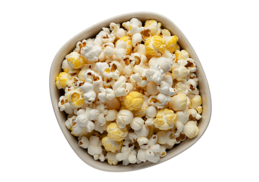 Overhead view of delicious buttery yellow and white popcorn filling a large, irregular-shaped, off-white bowl on transparent background
