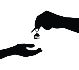 Hand holding a key symbolizing real estate and security.