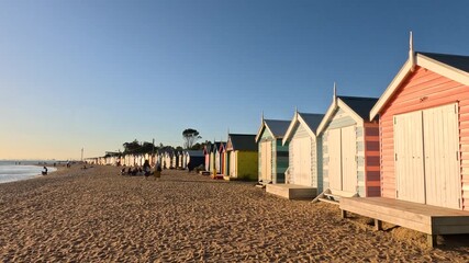 Colorful Brighton Beach huts at sunset in Melbourne – serene coastal and seaside landscape 4k video