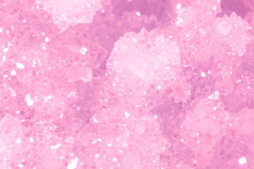 Amethyst pink crystals. Gems. Mineral crystals in the natural environment. Texture of precious and semiprecious stones. Seamless background with copy space colored shiny surface of precious stones.