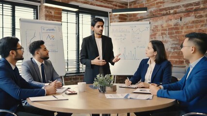 Diverse Business Team Meeting Around Table: Presentation, Collaboration, and Strategy Discussion in Modern Office - Powered by Adobe