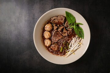 Thai Boat Noodles (Kuay Teow Reua) with Blood Soup, pork, Meatballs, and Basil